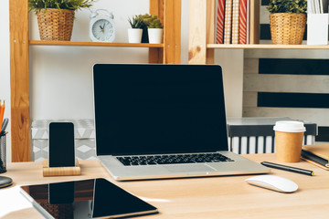 Sticker - Stylish office table desk. Workspace with laptop. Close up.