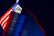 Oil prices fall concept. Mini Oil barrel against decline chart