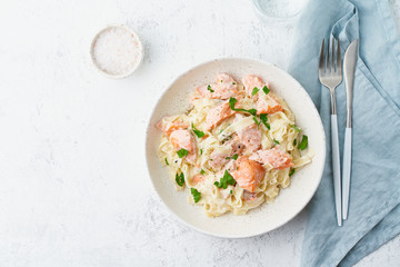 Poster - Salmon pasta, tagliatelle with fish and creamy sauce. Italian dinner with seafood