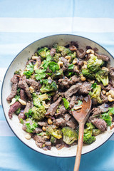 Wall Mural - Stir-fried beef with cashews and broccoli