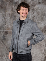 Studio portrait of attractive young man. Young Male Fashion Model Posing In Casual Outfit. 