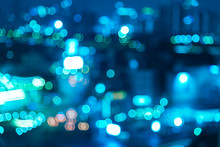 Defocused Image Of Blue Illuminated Lights At Night