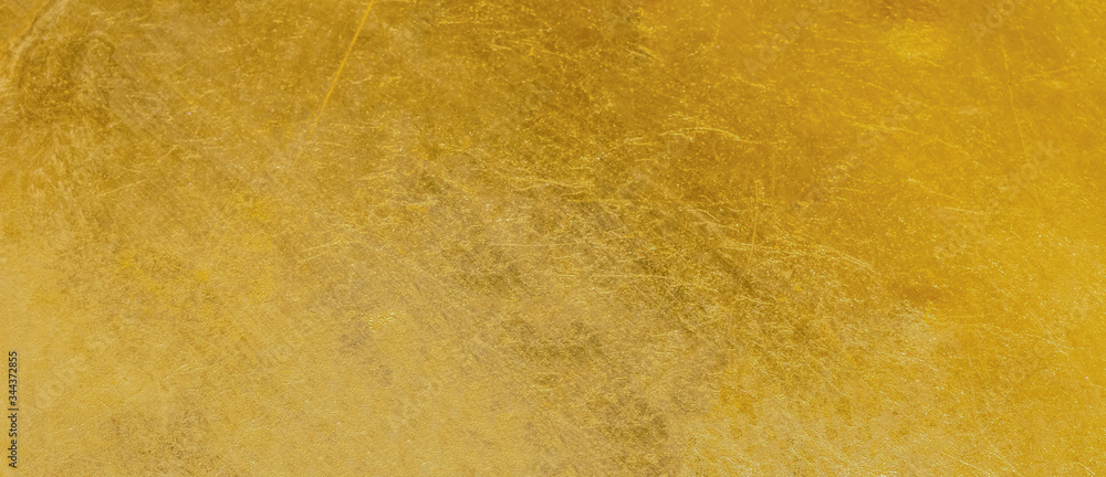 Gold texture background with yellow luxury shiny shine glitter sparkle of bright light reflection on golden surface - obrazy, fototapety, plakaty 