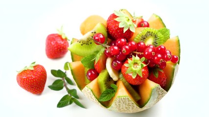 Wall Mural - fresh fruit salad in melon bowl