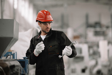 Wall Mural - Portrait of worker in factory.	