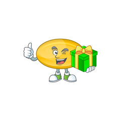 Wall Mural - Smiley oil capsule cartoon character holding a gift box