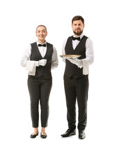Male And Female Waiters On White Background