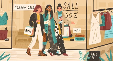 Wall Mural - Trendy girls shopping together. Modern young women walking near fashion outlet or boutique and holding bags with purchases. Seasonal sale, discounts. Vector illustration in flat cartoon style