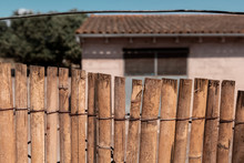 Low Angle View Of Fence Against Building
