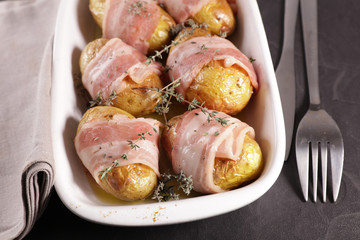 baked potato with bacon and rosemary