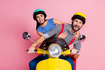 Poster - Portrait of his he her she nice attractive childish comic cheerful cheery couple driving moped having fun fooling isolated over pink pastel color background