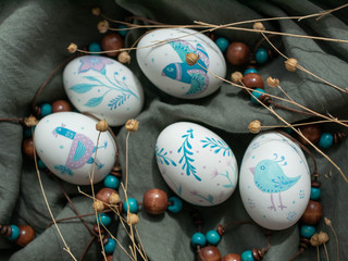 Wall Mural - Decoupage decorated Easter eggs with flowers and birds patterns. Hand painted Easter eggs. 