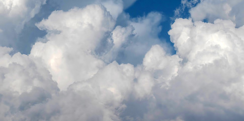 Wall Mural - Puffy Clouds on Blue Sky