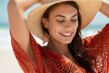 Glamour Girl Wearing Straw Hat At Beach