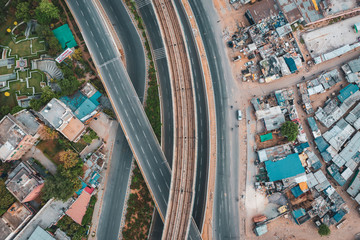 Top down aerial view of empty emptySikanderpur flyover during Covid 19 lockdown in Gurgaon city, Delhi NCR, India.