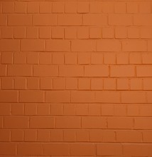 Orange Painted Smooth Brick Wall, For Texture Or Background