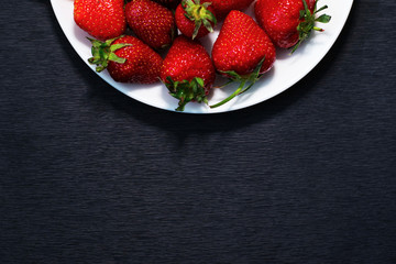 Strawberries on a white plate