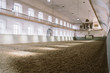 Royal manege with sand for horses in Denmark Copenhagen in territory Christiansborg Slot. Riding hall with sandy covering. Indoor riding facility at equestrian center. Horse arena interior