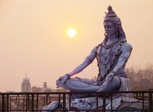 Shiva Statue Against Sky During Sunrise