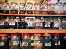 Various Spices In Jars For Sale At Store