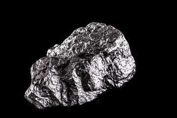Rhodium nugget, chemical element with Rh symbol, metal for industrial use, used in jewelry and automatic equipment.