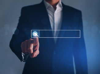 Fototapete - Businessman clicking internet search page  touch screen. Searching browsing internet data, information networking, search new job Concept..
