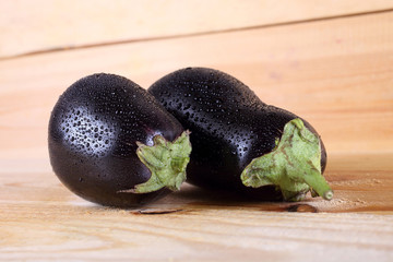 Aubergines on table