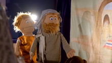 Puppet Theater Playing Bible Story: Puppet Man With Beard And In Typical Asian Clothing