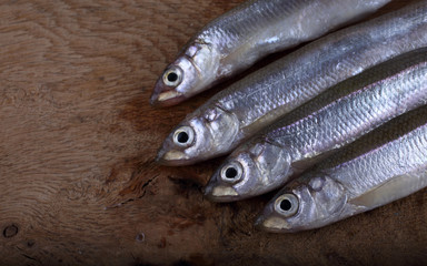 Wall Mural - Smelt fish on cutting board