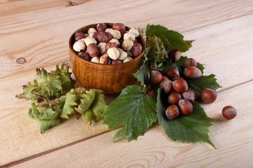 Canvas Print - Hazelnuts on table