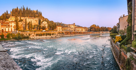 Wall Mural - Panoramic view of the Adige river and San Pietro Castle on a hill in Verona, Italy.