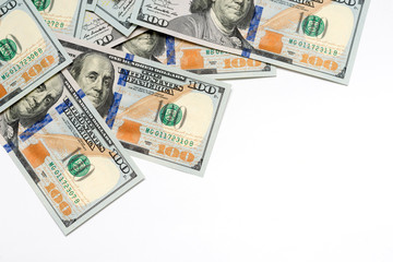 several dollar bills on a white background