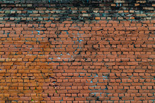 An Old Crumbling Brick Wall