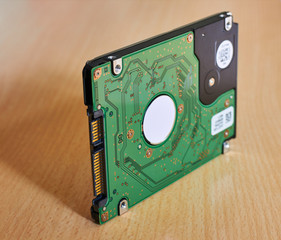 hard drive on wooden background