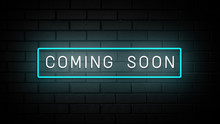 Coming Soon Neon Sign. White And Blue Glow. Neon Text. On Brick Wall Background