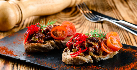 Canvas Print - set of different bruschetta with beef tartare