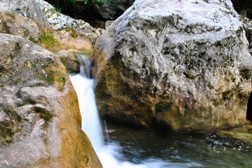 stone stones water waterfall flowing water summer moss clear water vacation nature