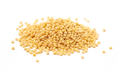 Wall Mural - Whole Millet Pearl Grains on a White Background