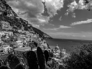 Black and White Photography of a View of Positano village on a cloudy day.