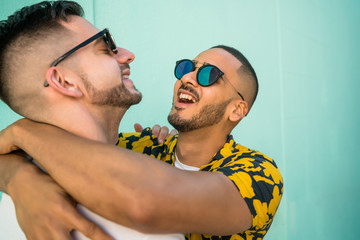 Wall Mural - Gay couple spending time together.