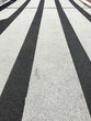 © Amsterdam/Stocksy - lines on asphalt road