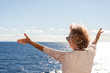 © Gillian Vann/Stocksy - senior woman on a cruise vacation