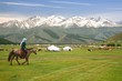 ride a horse in a large meadow at   Naryn of Kyrgyzstan