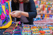 © Per Swantesson/Stocksy - woman trying on bracelet