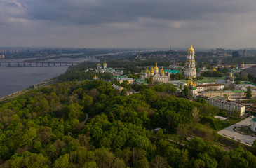 Wall Mural - Aerial view of Kiev Pechersk Lavra illuminated by the sunset rays of the sun, Kyiv, Ukraine