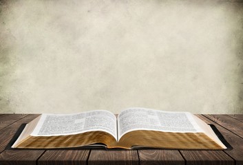 Wall Mural - Open vintage christian bible on background