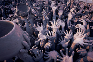 abstract many hand in hold of hell horror concept background