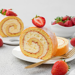 Wall Mural - Tasty roll cake stuffed with cream cheese ,decorated with fresh strawberry