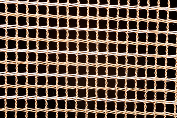brown net textured background, details of a mosquito net 