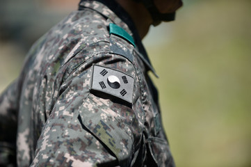 the South Korean Flag Taegeukgi attached to the South  Korean Army uniform.